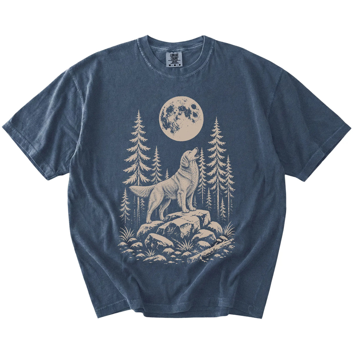 Golden Retriever howling beneath the moon and pine trees on a Denim Comfort Colors® T-shirt