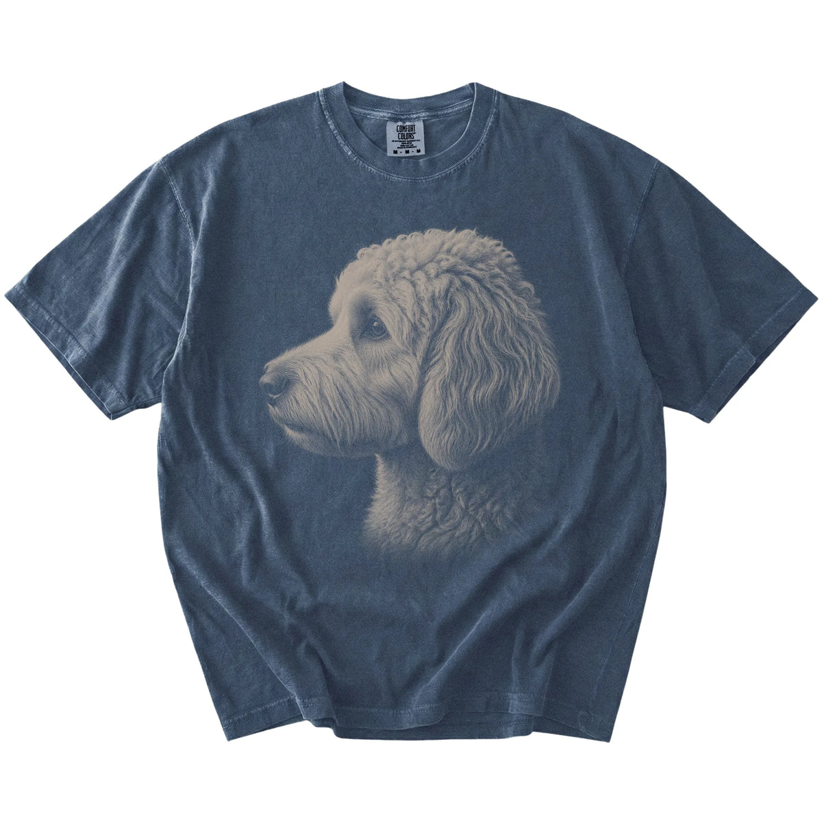 A detailed photographic portrait of a Goldendoodle on a Denim Comfort Colors® T-shirt