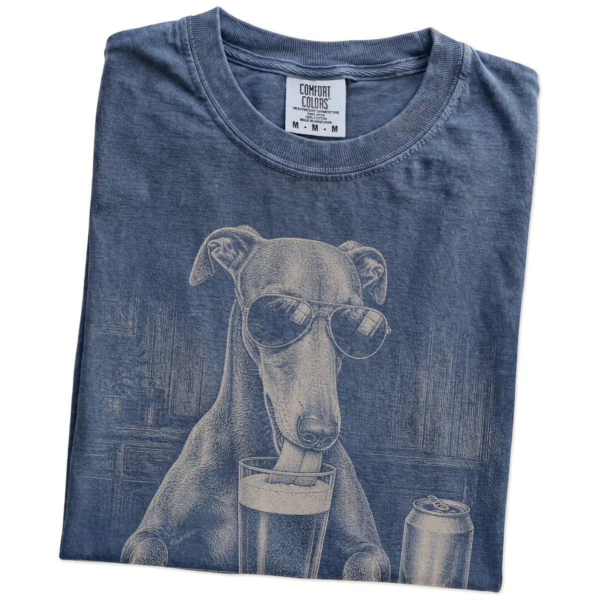 Folded Denim Comfort Colors® t-shirt showing Greyhound sneaking a drink from a pint