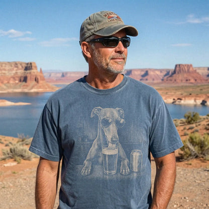 Model wearing a Denim Comfort Colors® t-shirt with Greyhound sneaking a drink from a pint