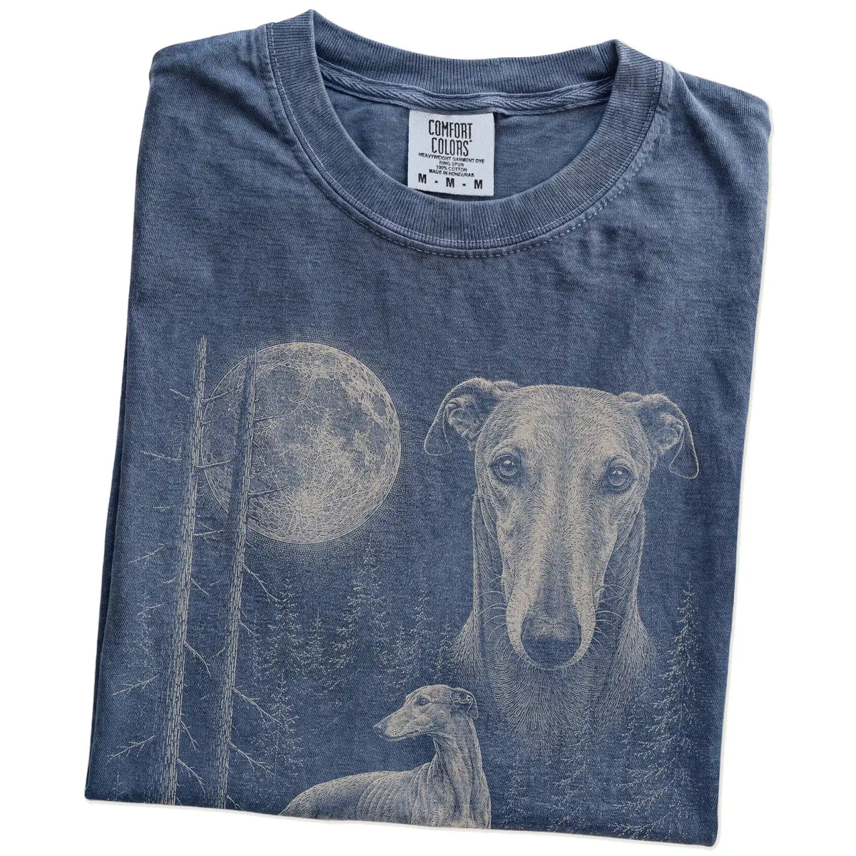 Folded Denim Greyhound Moonlit Forest T-Shirt showing the graphic