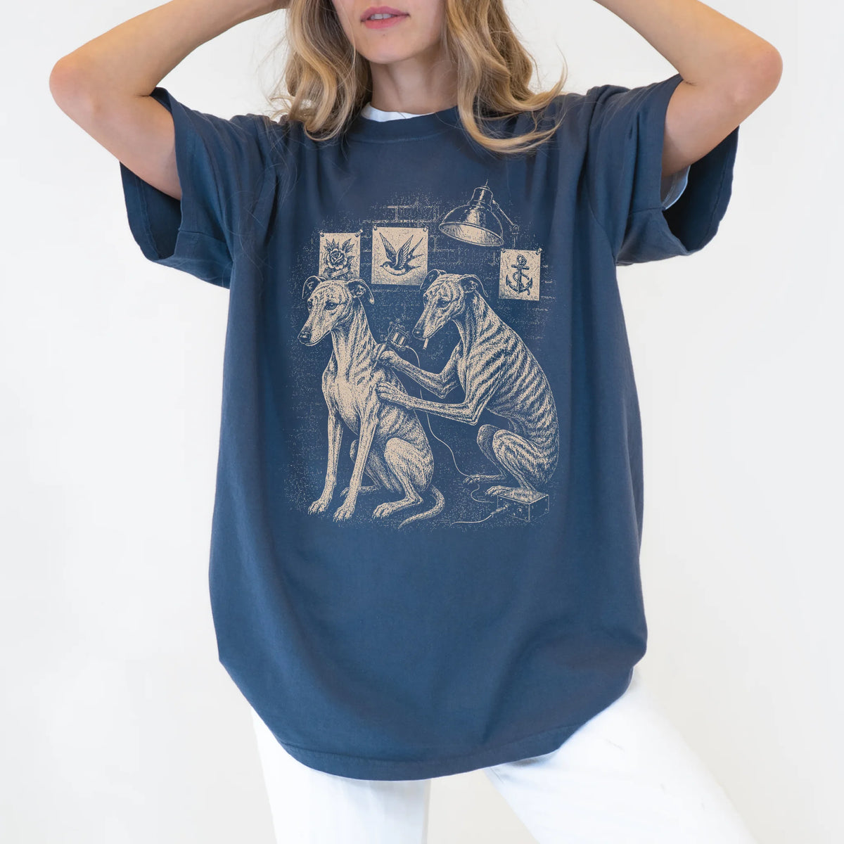 Person wearing a Denim Greyhound Tattoo t-shirt