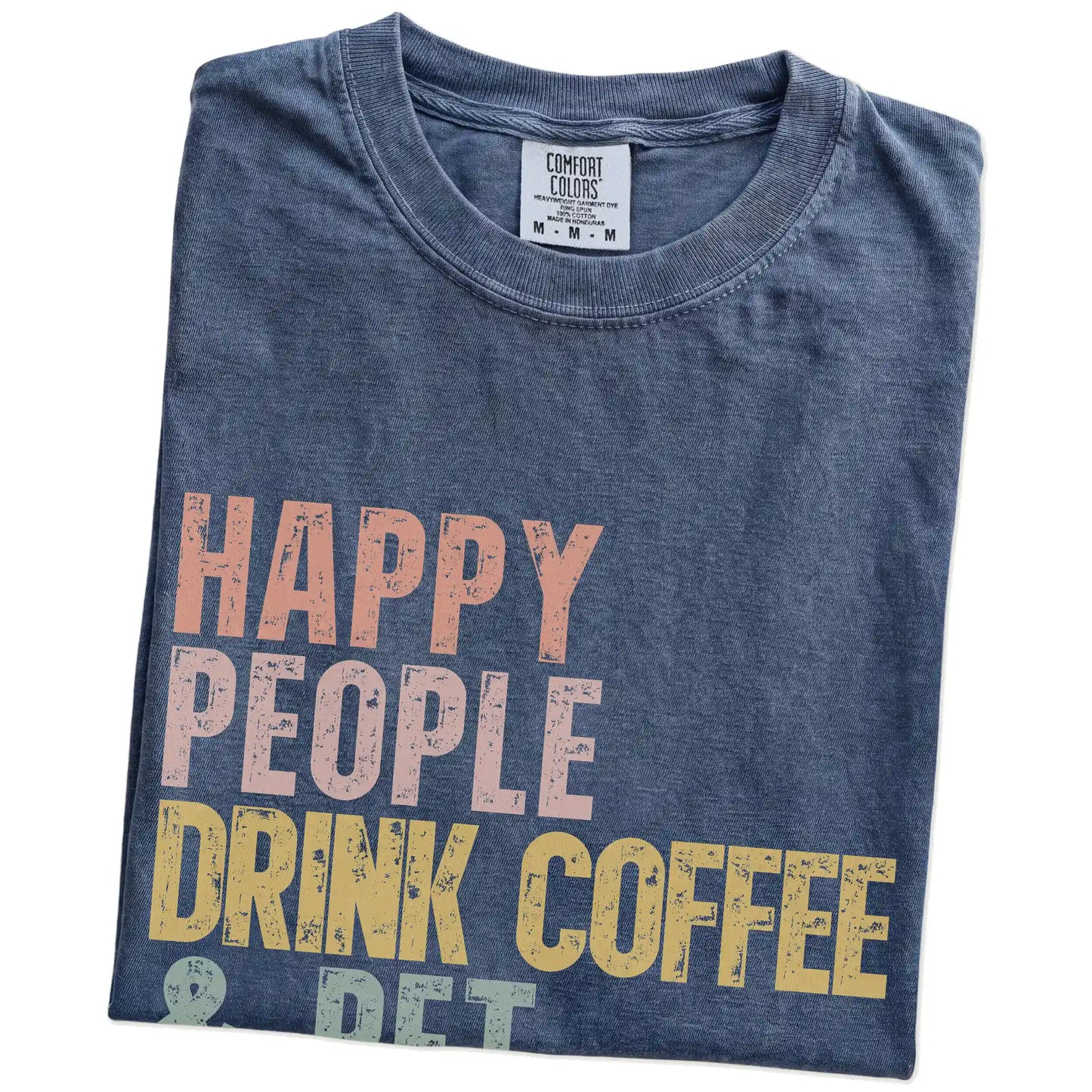 Folded Denim Comfort Colors® T-shirt showing Pointer with coffee and “Happy People Drink Coffee and Pet Dogs” lettering
