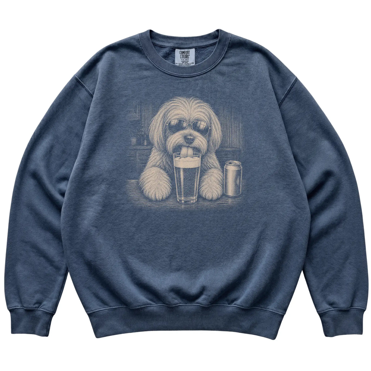 Denim Havanese drinking from a pint at a bar, laid flat