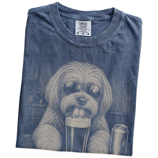 Folded Denim Comfort Colors® t-shirt showing Havanese sneaking a drink from a pint