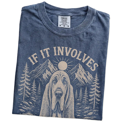 Folded Denim Comfort Colors® T-shirt showing Bloodhound hiking design with mountain scenery