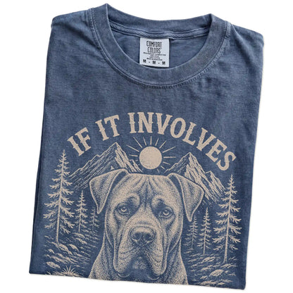 Folded Denim Comfort Colors® T-shirt showing Cane Corso hiking design with mountain scenery