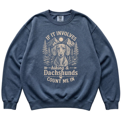 Denim Comfort Colors® sweatshirt featuring Hiking and Dachshunds, laid-flat presentation