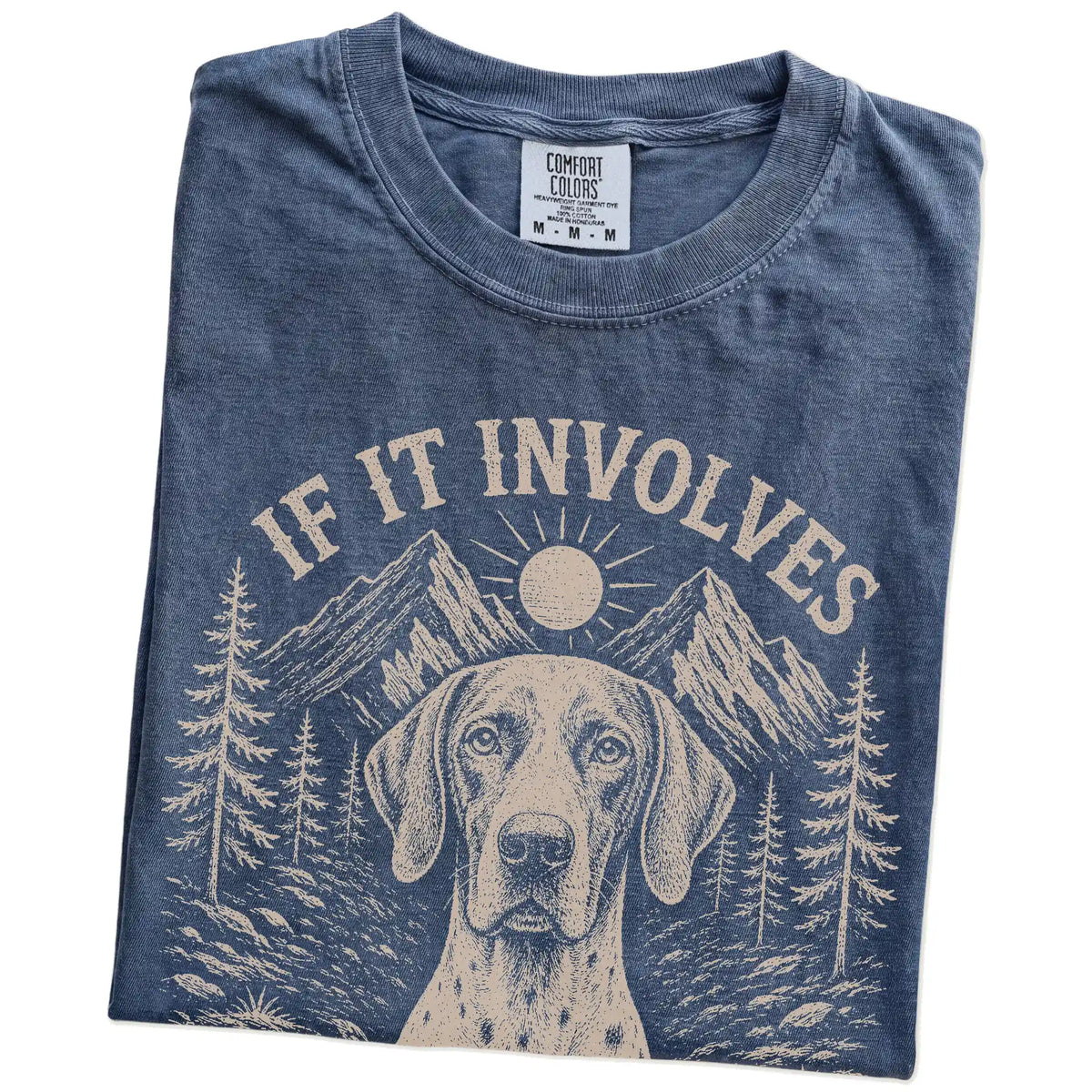 Folded Denim Comfort Colors® T-shirt showing Pointer hiking design with mountain scenery