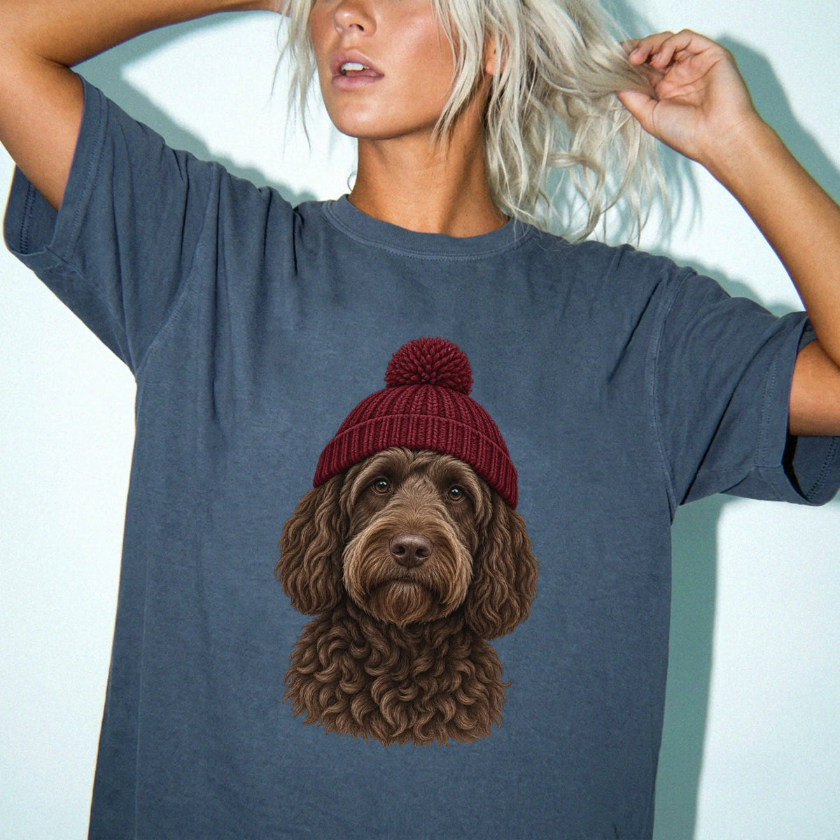 Woman wearing a Denim Labradoodle hipster T-shirt with a maroon-beanie dog portrait