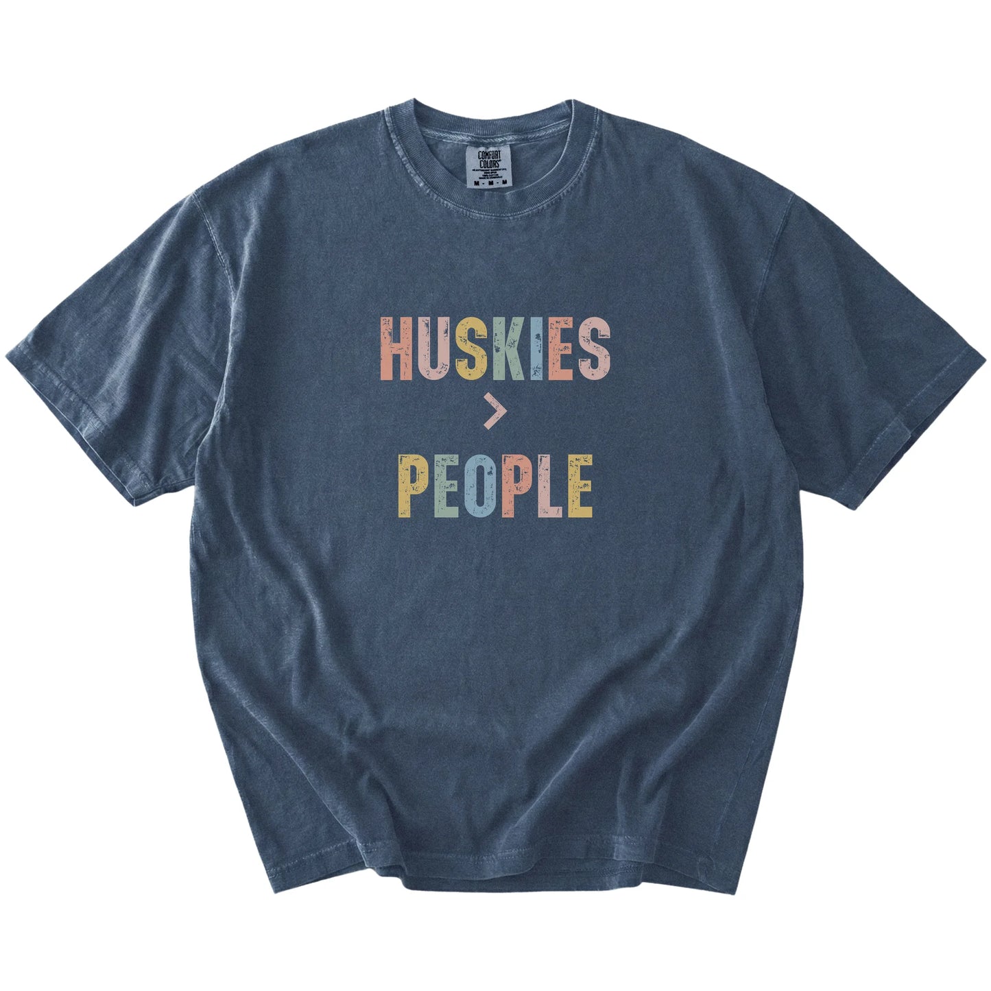 “Huskies > People” text on a Denim Comfort Colors® T-shirt
