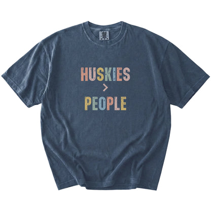 “Huskies > People” text on a Denim Comfort Colors® T-shirt