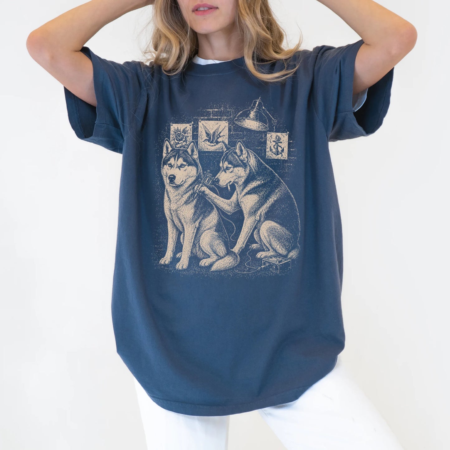 Person wearing a Denim Husky Tattoo t-shirt