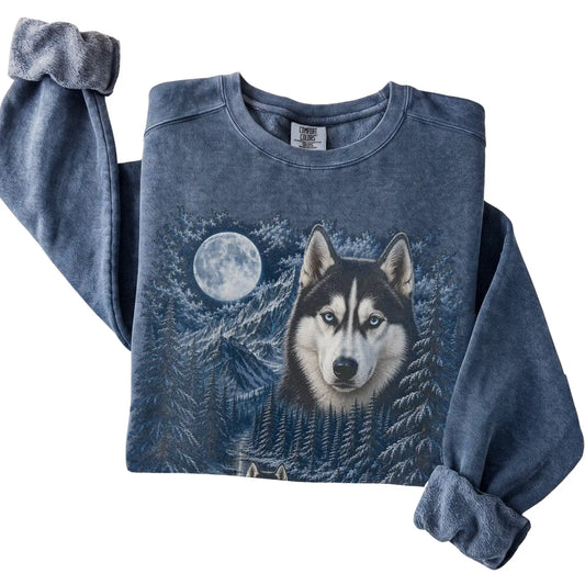 Folded denim sweatshirt with Husky Winter Moon artwork.