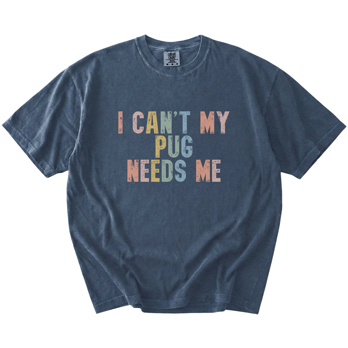 Pug with “I Can’t, My Dog Needs Me” lettering on a Denim Comfort Colors® T-shirt