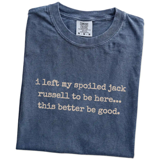 Folded Denim Comfort Colors® T-shirt showing the “I Left My Spoiled Jack Russell Home” saying