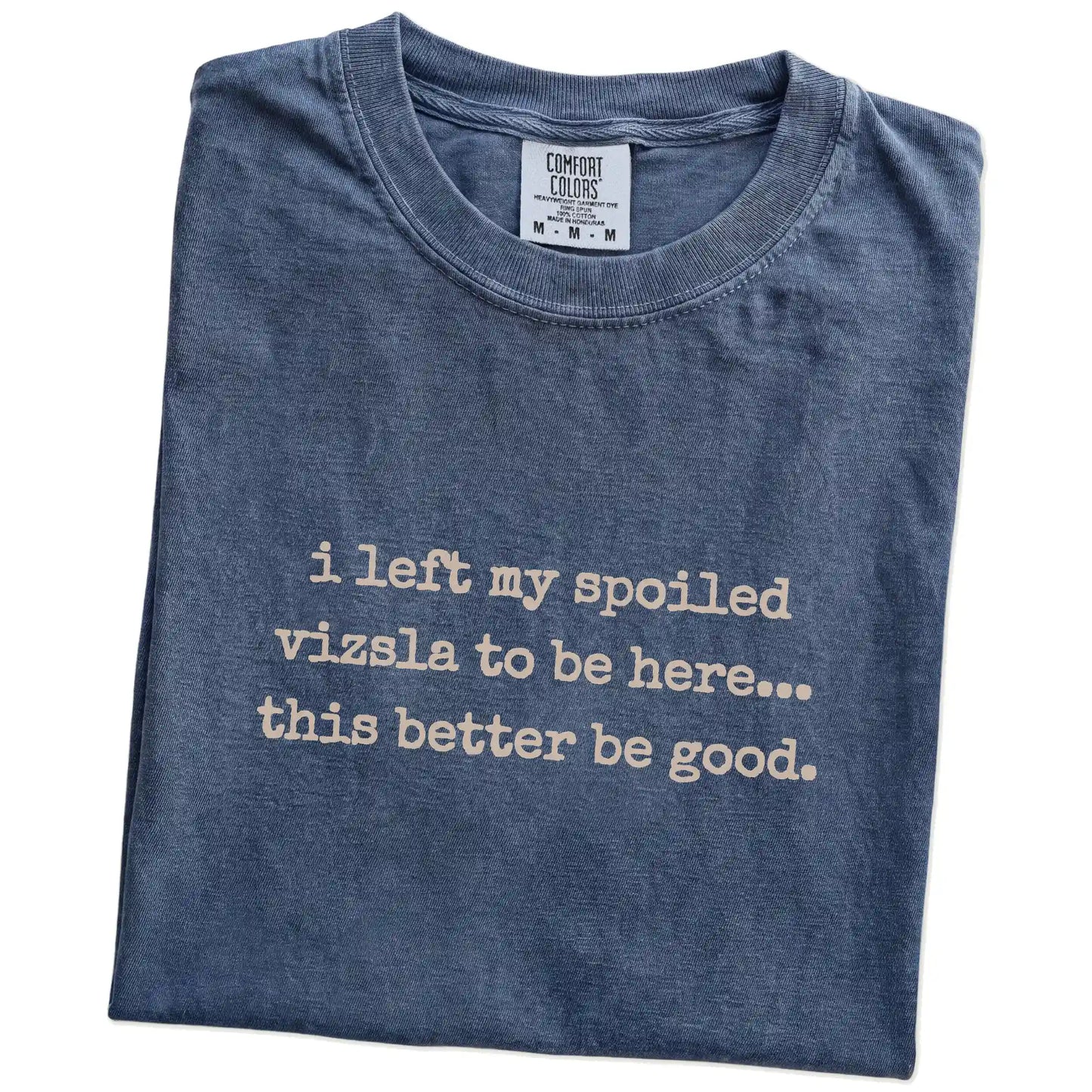 Folded Denim Comfort Colors® T-shirt showing the “I Left My Spoiled Vizsla Home” saying