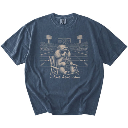 Poodle claiming the football field with “I Live Here Now” lettering on a Denim Comfort Colors® T-shirt