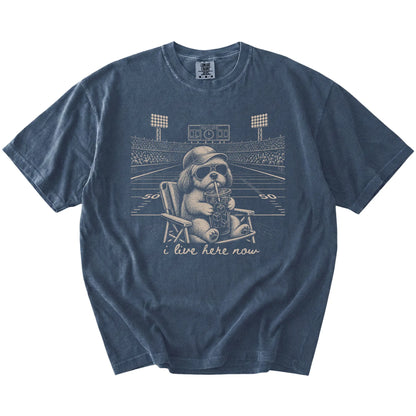 Shih Tzu claiming the football field with “I Live Here Now” lettering on a Denim Comfort Colors® T-shirt