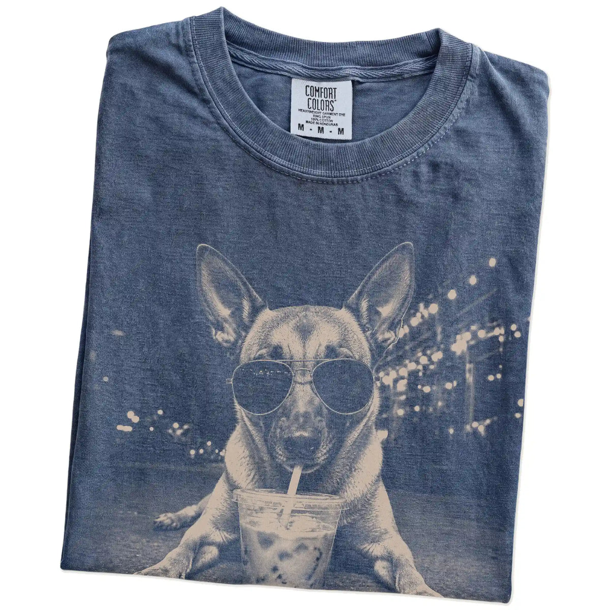 Folded Denim Comfort Colors® T-shirt showing Belgian Malinois with iced coffee in a retro grunge design