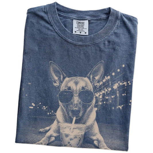 Folded Denim Comfort Colors® T-shirt showing Belgian Malinois with iced coffee in a retro grunge design