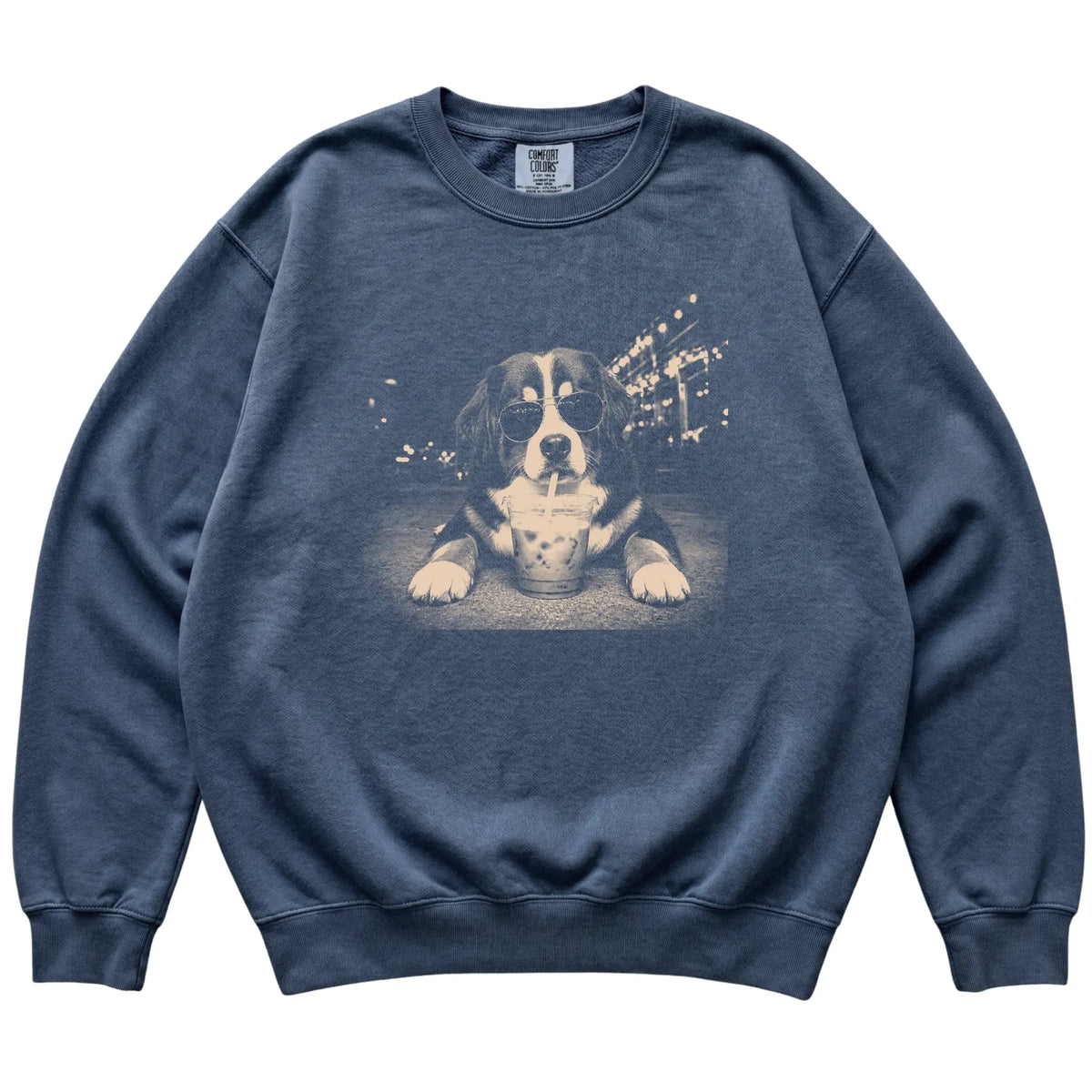 Bernese Mountain Dog wearing aviator sunglasses and drinking iced coffee on a Denim Comfort Colors 1566 Sweatshirt, flat lay view