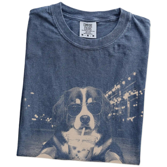 Folded Denim Comfort Colors® T-shirt showing Bernese Mountain Dog with iced coffee in a retro grunge design