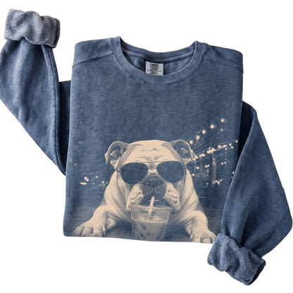 Bulldog wearing aviator sunglasses and drinking iced coffee on a Denim Comfort Colors 1566 Sweatshirt, folded view