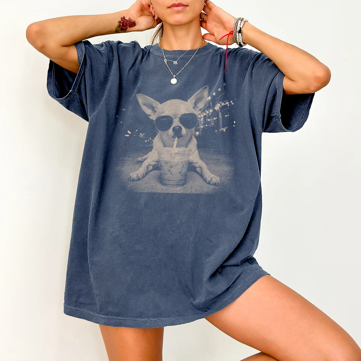 Woman wearing a Denim Iced Coffee Chihuahua Comfort Colors® T-shirt
