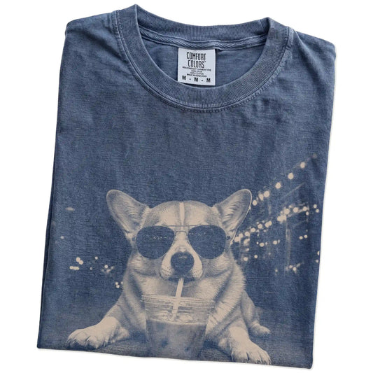 Folded Denim Comfort Colors® T-shirt showing Corgi with iced coffee in a retro grunge design
