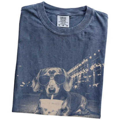 Folded Denim Comfort Colors® T-shirt showing Dachshund with iced coffee in a retro grunge design