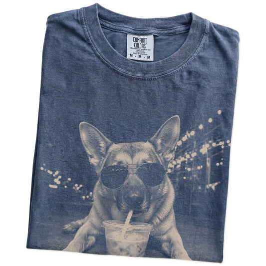 Folded Denim Comfort Colors® T-shirt showing German Shepherd with iced coffee in a retro grunge design