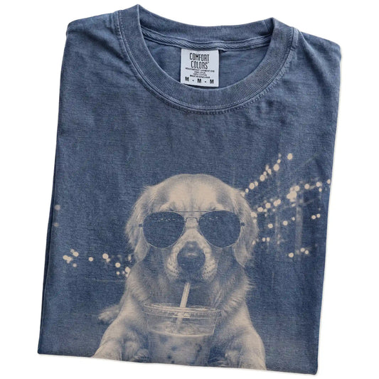 Folded Denim Comfort Colors® T-shirt showing Golden Retriever with iced coffee in a retro grunge design