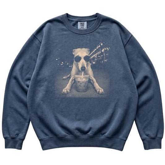 Greyhound wearing aviator sunglasses and drinking iced coffee on a Denim Comfort Colors 1566 Sweatshirt, flat lay view