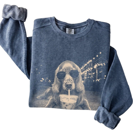 Irish Setter wearing aviator sunglasses and drinking iced coffee on a Denim Comfort Colors 1566 Sweatshirt, folded view