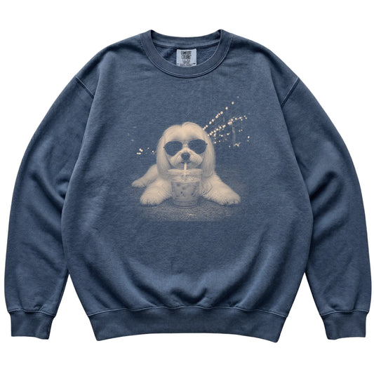 Maltese wearing aviator sunglasses and drinking iced coffee on a Denim Comfort Colors 1566 Sweatshirt, flat lay view