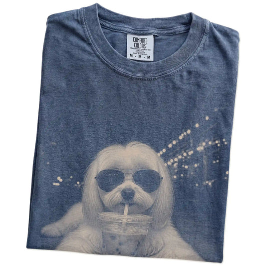 Folded Denim Comfort Colors® T-shirt showing Maltese with iced coffee in a retro grunge design