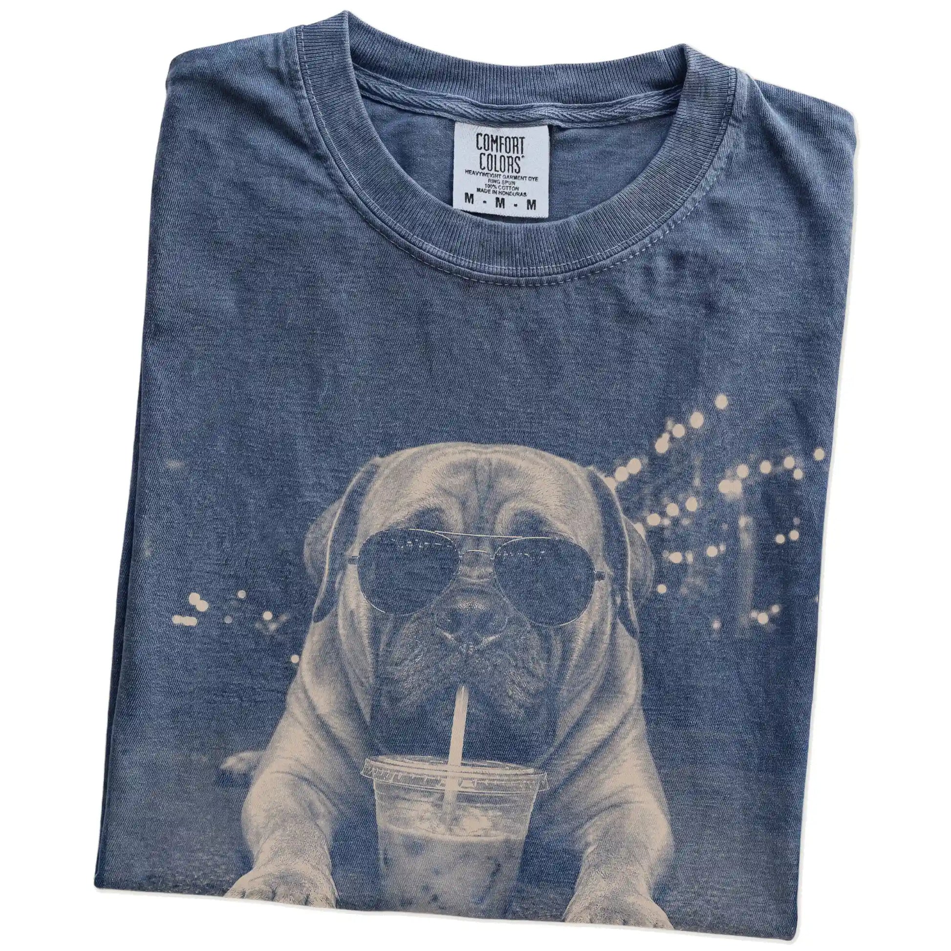 Folded Denim Comfort Colors® T-shirt showing Mastiff with iced coffee in a retro grunge design