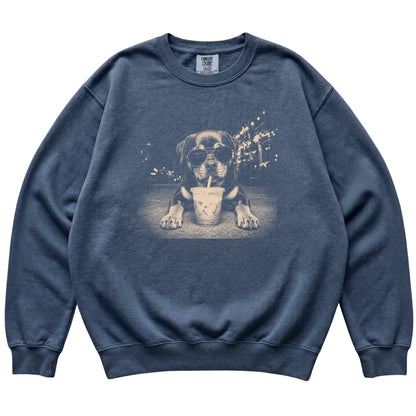 Rottweiler wearing aviator sunglasses and drinking iced coffee on a Denim Comfort Colors 1566 Sweatshirt, flat lay view