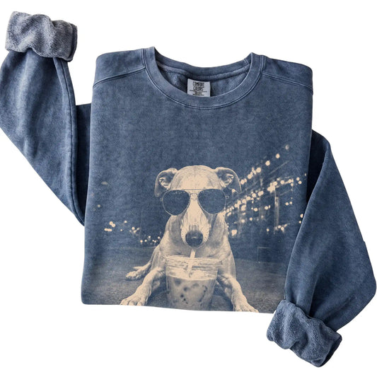 Whippet wearing aviator sunglasses and drinking iced coffee on a Denim Comfort Colors 1566 Sweatshirt, folded view
