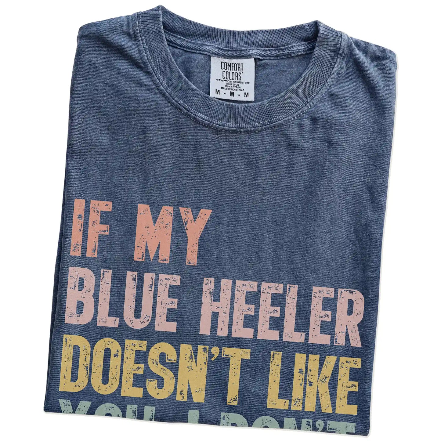 Folded Denim Comfort Colors® T-shirt showing Blue Heeler with “If My Dog Doesn’t Like You, I Don’t Either” lettering