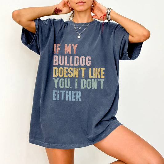 Model wearing a Denim Comfort Colors® T-shirt featuring Bulldog with “If My Dog Doesn’t Like You, I Don’t Either” lettering