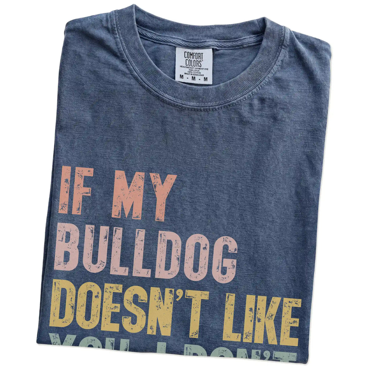 Folded Denim Comfort Colors® T-shirt showing Bulldog with “If My Dog Doesn’t Like You, I Don’t Either” lettering