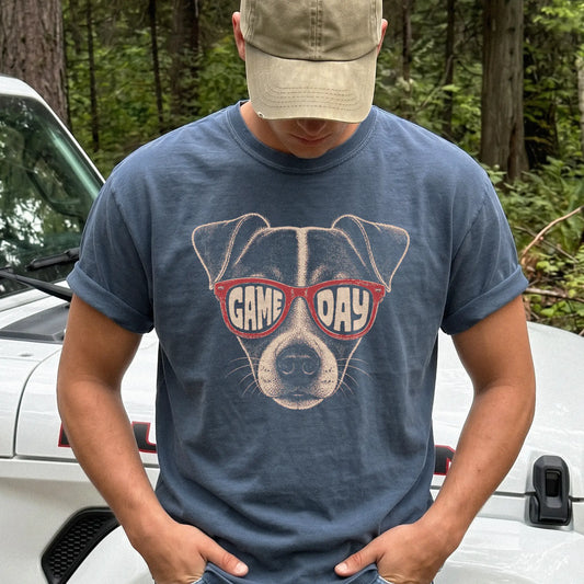Model wearing a Denim Comfort Colors® T-shirt with jack russell wearing red game day sunglasses