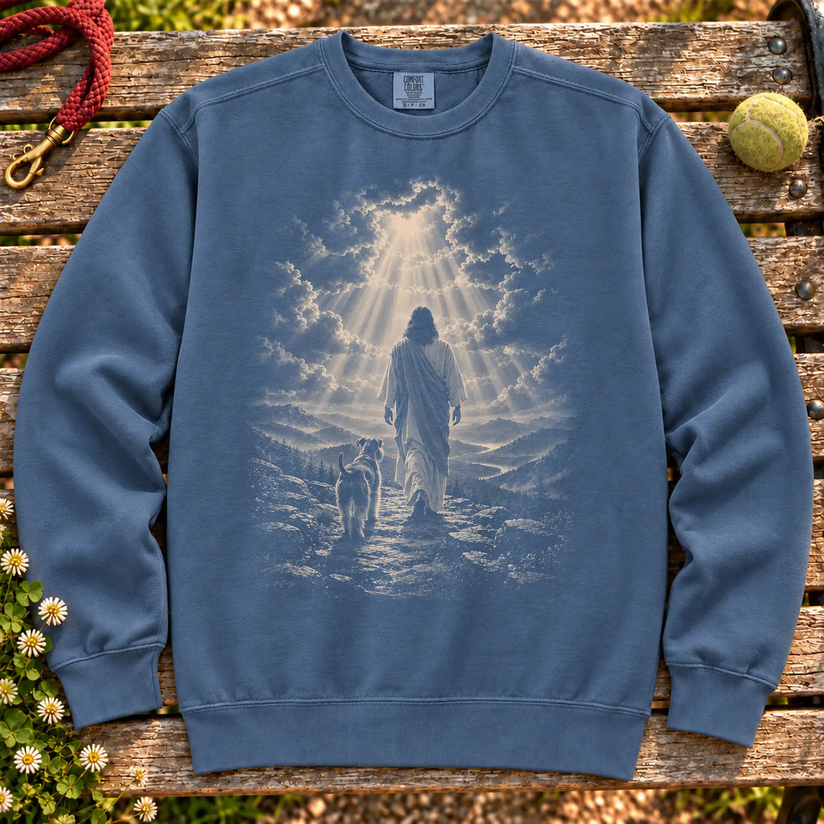Denim sweatshirt showing Jesus walking beside a Schnauzer beneath rays of light