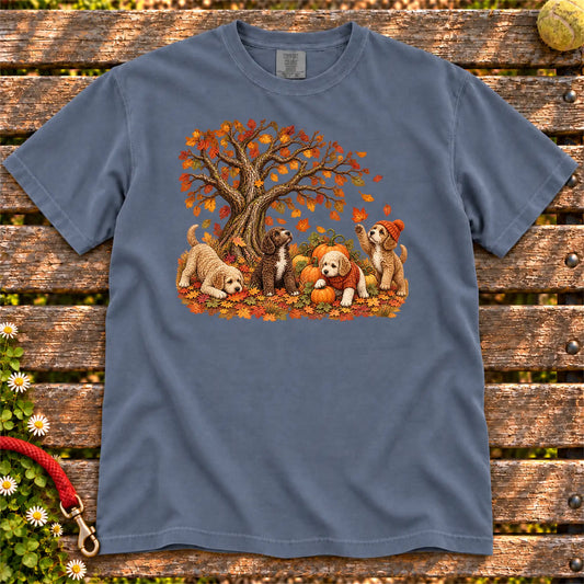 Four Labradoodle puppies with pumpkins beneath an autumn tree on a Denim garment-dyed T-shirt