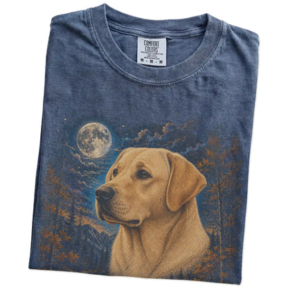 Folded denim T-shirt with Labrador Retriever Autumn Moon artwork.