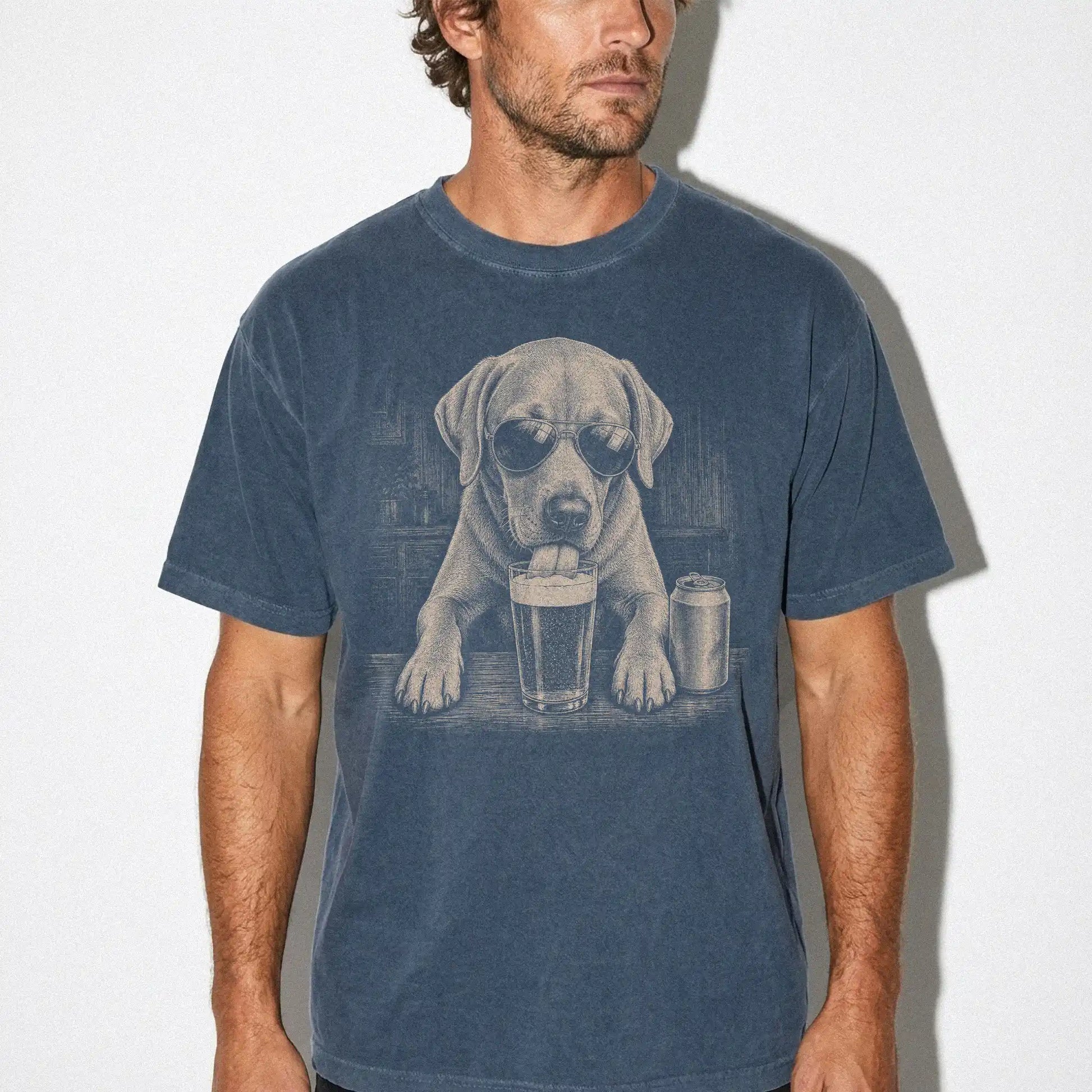 Model wearing a Denim Comfort Colors® t-shirt with Labrador Retriever sneaking a drink from a pint