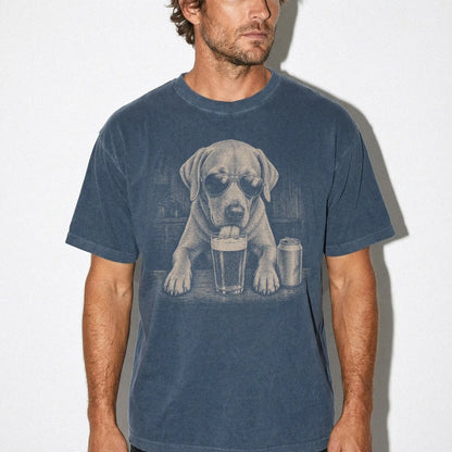 Model wearing a Denim Comfort Colors® t-shirt with Labrador Retriever sneaking a drink from a pint