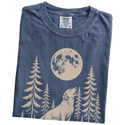 Folded Denim Comfort Colors® T-shirt showing a Labrador Retriever howling beneath the moon and pine trees